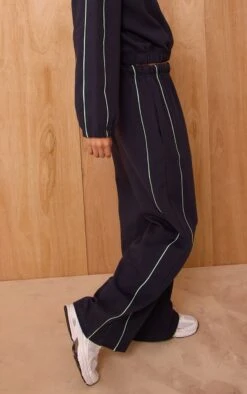 Prettylittlething Navy Interlock Contrast Piping Wide Leg Sweatpants -Pretty Little Thing Shop 00727793cc3fe3c911869cff7fbcfabc78cf5796 CNO6005 2 navy interlock contrast piping wide leg joggers