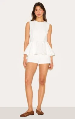 Prettylittlething White Cotton Peplum Skort Romper 6 Prettylittlething White Cotton Peplum Skort Romper -Pretty Little Thing Shop 0a85300e7dc0b4906bfbbe5b99ef677559d57826 CNM7287 3 white cotton peplum skort playsuit