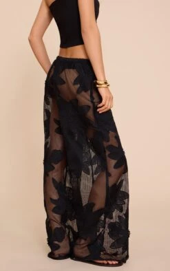 Prettylittlething Black Textured Flower Detail Wide Leg Pants -Pretty Little Thing Shop 0b27c7f00f21a2406f0ce043b36edd2e6f713fe3 CNN3531 3 black textured flower detail wide leg trousers