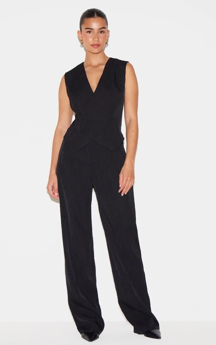 Prettylittlething Black Woven Asymmetric Detail Vest Straight Leg Jumpsuit 1 Prettylittlething Black Woven Asymmetric Detail Vest Straight Leg Jumpsuit