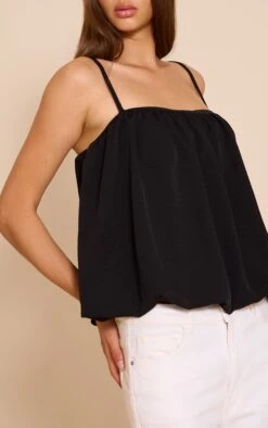 Prettylittlething Black Chiffon Strappy Puff Ball Top -Pretty Little Thing Shop 0cf700789de2f58a4354f77486d19564933fe993 CNN1114 3 black chiffon strappy puff ball crop top