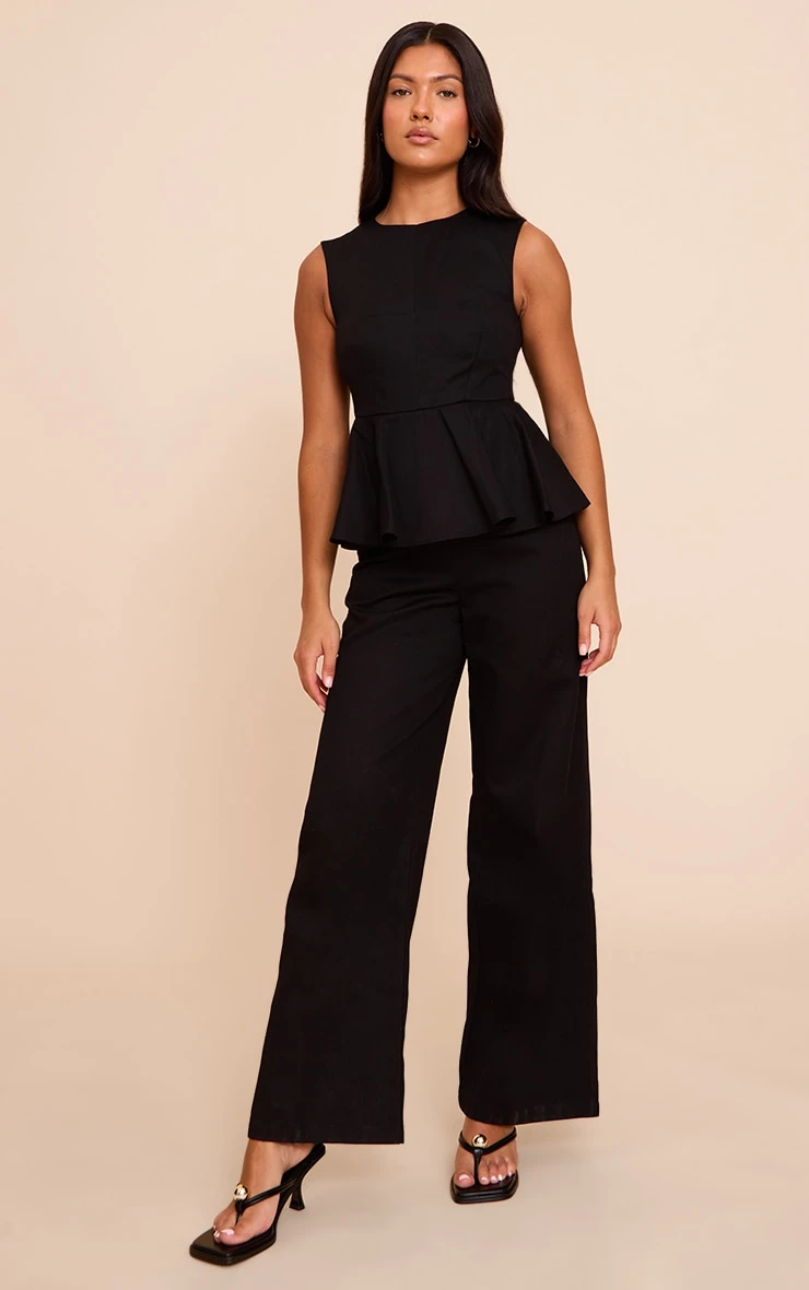 Prettylittlething Black Cotton Peplum Detail Wide Leg Jumpsuit 1 Prettylittlething Black Cotton Peplum Detail Wide Leg Jumpsuit