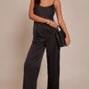 Prettylittlething Black Satin Scoop Neck Straight Leg Jumpsuit -Pretty Little Thing Shop 0f1808ce20ec0eca4bdf05591a314fef74149942 CNO3092 1 black satin scoop neck straight leg jumpsuit