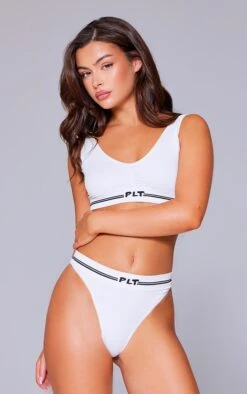 PRETTYLITTLETHING Cream Seamless Ribbed Bra -Pretty Little Thing Shop 12a49b634d447af0f2ffa209ac71d6abb68f1683 cnk2347 3