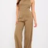 Taupe Textured Halterneck Low Back Jumpsuit -Pretty Little Thing Shop 188743cc1f058b16b0b102e41989551f61a403d1 cnh7903 2