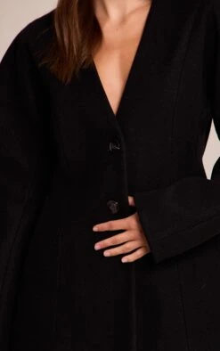 Prettylittlething Black Wool Look Collarless Cocoon Sleeve Blazer 7 Prettylittlething Black Wool Look Collarless Cocoon Sleeve Blazer -Pretty Little Thing Shop 1c46be81fcece0c26926b39d9c51205d832f9fdc CNN8541 4 black wool look collarless cocoon sleeve blazer