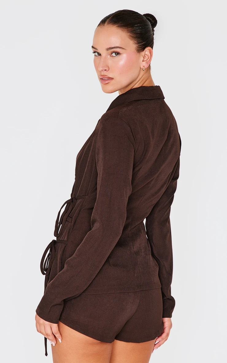 Prettylittlething Dark Chocolate Premium Tailored Woven Wrap Front Romper 2 Prettylittlething Dark Chocolate Premium Tailored Woven Wrap Front Romper - Image 2