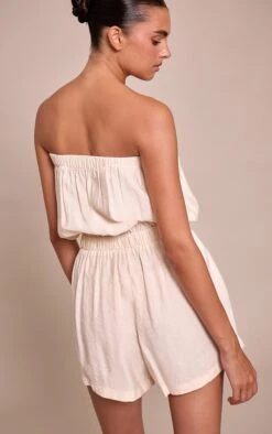 Prettylittlething Cream Woven Textured Bandeau Romper -Pretty Little Thing Shop 1d82439d3950ab2366a0da0e610ee4bf23291b1b CNN5509 2 cream woven textured bandeau playsuit