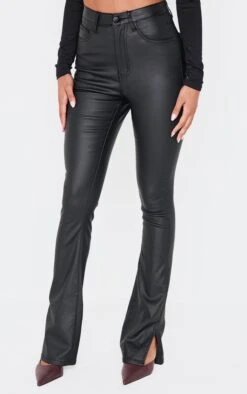 Prettylittlething Black Coated Denim Split Hem Flares