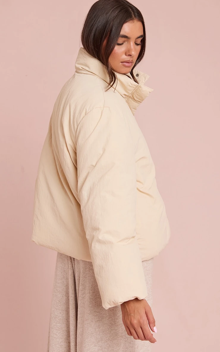 Prettylittlething Cream High Neck Tie Waist Quilted Puffer Jacket 2 Prettylittlething Cream High Neck Tie Waist Quilted Puffer Jacket - Image 2