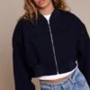Prettylittlething Navy Ruched Sleeve Cropped Bomber Jacket -Pretty Little Thing Shop 277fca3d3a883e9409e44781df699afc39b9862c CNN7104 1 navy ruched sleeve cropped bomber jacket