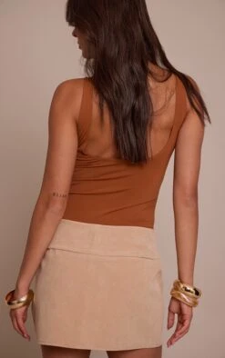 Prettylittlething Sand Faux Suede Mini Skirt -Pretty Little Thing Shop 28c9178232fa467956ede643aed9144e89e88286 CNO4074 3 sand faux suede mini skirt
