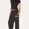 PRETTYLITTLETHING Black Premium Studio Print Cuffed Sweatpants 10 PRETTYLITTLETHING Black Premium Studio Print Cuffed Sweatpants -Pretty Little Thing Shop 2aeff954925e5d3add092ff628d186b198bcd3d5 cnk2775 1