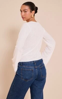 Prettylittlething Ecru Rib Onion Skin Flare Long Sleeve Top -Pretty Little Thing Shop 2b17e75bca5431b848f886c08496b666c9972d7a CNN6833 2 ecru rib onion skin flare long sleeve top