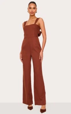 Prettylittlething Chocolate Woven Cut Out Bow Detail Jumpsuit 6 Prettylittlething Chocolate Woven Cut Out Bow Detail Jumpsuit -Pretty Little Thing Shop 2c73856f41359bfa4546b6213dd56f64e295df9e CNL7247 2 chocolate woven cut out bow detail jumpsuit