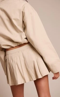 Prettylittlething Sand Pleated Denim Mini Skirt -Pretty Little Thing Shop 32675c8e3fa6ed980c6449a4b2666df00958a3ee CNN6872 3 sand pleated denim mini skirt