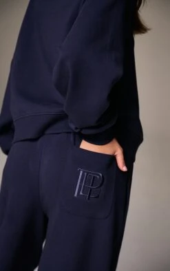 Prettylittlething Navy Embroidered Interlock Wide Leg Sweatpant 8 Prettylittlething Navy Embroidered Interlock Wide Leg Sweatpant -Pretty Little Thing Shop 370e9a1915eb045c6ac262bd04418981d97a5447 CNN3189 4 navy embroidered interlock wide leg jogger