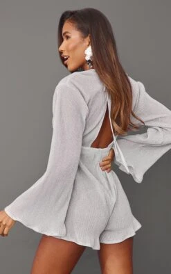 Prettylittlething Silver Glitter Plisse Flare Sleeve Plunge Romper 6 Prettylittlething Silver Glitter Plisse Flare Sleeve Plunge Romper -Pretty Little Thing Shop 37e6e88c4d6784c8221f56281d3f7d72e47ca153 cnb5792 2