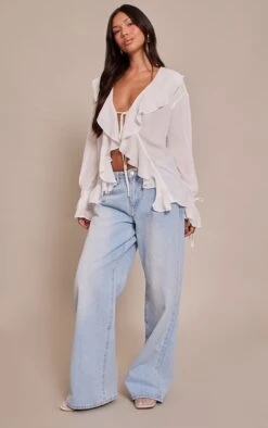 White Chiffon Ruffle Tie Front Blouse -Pretty Little Thing Shop 3e9d99ae17bdf6db6184871624584dae79ca161e CNO0754 3 white chiffon ruffle tie front blouse