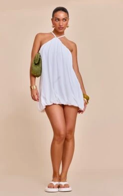 Prettylittlething White Textured Halterneck Linen Look Puffball Dress -Pretty Little Thing Shop 43789b3ba234188756e6e2855e7c3b8c6546bbf2 CNN0102 3 white textured halterneck linen look puffball dress