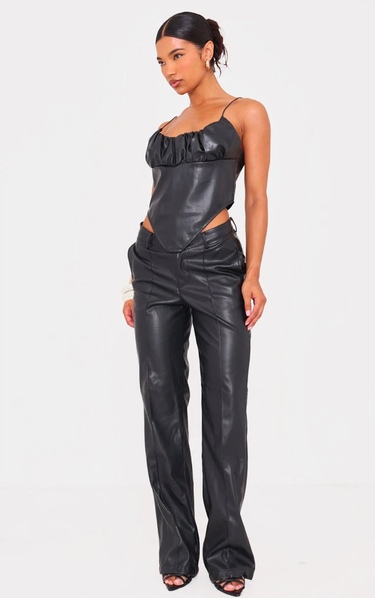 Prettylittlething Black Faux Leather Dip Waist Flared Pants 1 Prettylittlething Black Faux Leather Dip Waist Flared Pants