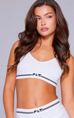 PRETTYLITTLETHING Cream Seamless Ribbed Bra -Pretty Little Thing Shop 597757d33203a3104abfc2bdf2e32b1c87431a45 cnk2347 4