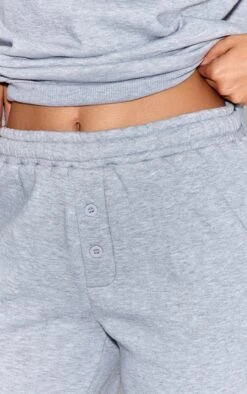 Grey Marl Button Up Wide Leg Sweatpants -Pretty Little Thing Shop 5b9ea125670b0435a3ef7c3622ddba495d141868 CNO1293 4 grey marl button up wide leg joggers