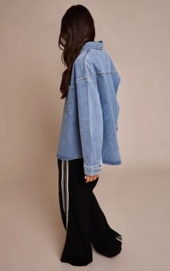 Prettylittlething Mid Blue Wash Oversized Single Pocket Detail Denim Shirt -Pretty Little Thing Shop 5f0c731c76768e1a914f036ed8a99c353a1a514c CNN9134 2 mid blue wash oversized single pocket detail denim shirt