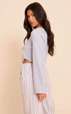 Prettylittlething Light Blue Textured Tie Front Detail Blouse -Pretty Little Thing Shop 65077749dd893bb28f7b7abab7c544f06e95e9de CNN6740 2 light blue textured tie front detail blouse