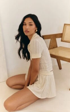 Prettylittlething Cream Textured Button Detail Mini Skort -Pretty Little Thing Shop 66f7e1ca6baf8b0d8750251f656aa6be5f7a981a CNM6173 4 cream textured button detail mini skort