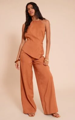 Prettylittlething Rust Textured Woven Halter Neck Jumpsuit 7 Prettylittlething Rust Textured Woven Halter Neck Jumpsuit -Pretty Little Thing Shop 692048e744261fdd9365187ed54d7617b9690b2e CNN3666 3 rust textured woven halter neck jumpsuit