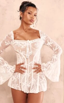 Prettylittlething White Lace Flared Sleeve Binding Detail Romper 8 Prettylittlething White Lace Flared Sleeve Binding Detail Romper -Pretty Little Thing Shop 6f7eccfcbec8fe5a0523942c9ff7f9841e097437 CNN2044 4 white lace flared sleeve binding detail playsuit