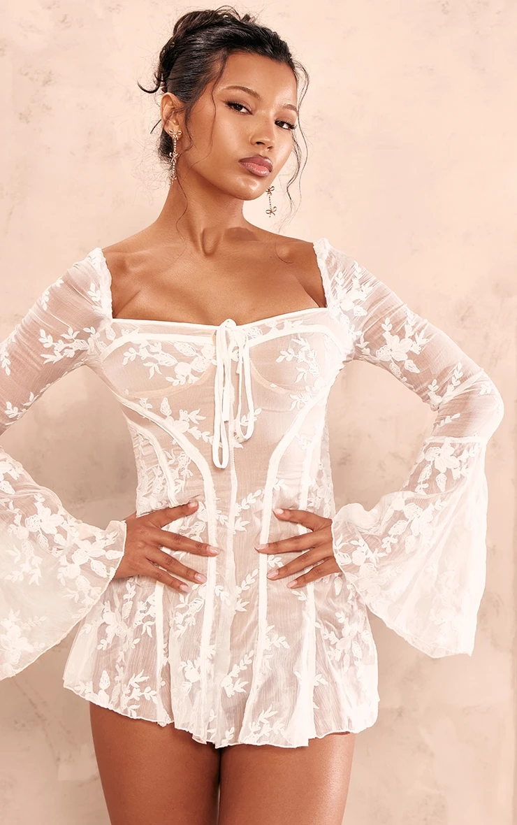 Prettylittlething White Lace Flared Sleeve Binding Detail Romper 4 Prettylittlething White Lace Flared Sleeve Binding Detail Romper - Image 4