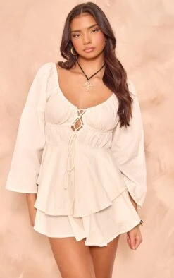 Prettylittlething White Lace Up Front Longsleeve Romper -Pretty Little Thing Shop 72fefe31a6732b6faa6f822a97d657f801e96317 cnh7907 1