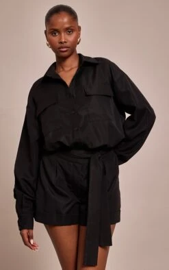 Black Woven Relaxed Long Sleeve Romper