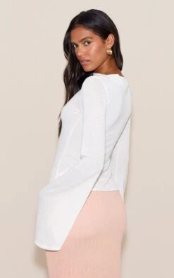 Prettylittlething White Textured Extreme Flute Sleeve Long Top -Pretty Little Thing Shop 755909cb689092fc7839fccc1bc2fc45c30e760c CNM9670 2 white textured extreme flute sleeve long top