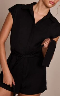 Prettylittlething Black Woven Belt Detail Collar Romper -Pretty Little Thing Shop 806c6b6f21c4bb3dc995ae665704d753140fce7c CNO3096 4 black woven belt detail collar playsuit