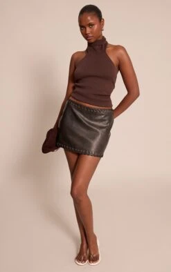 Prettylittlething Black Faux Leather Plaited Mini Skirt -Pretty Little Thing Shop 88030f6dfbaecb1d84566b202a6ac190b7cc03ed CNO4338 4 black faux leather plaited mini skirt