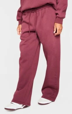 PRETTYLITTLETHING Burgundy Athletics Club Embossed Straight Leg Sweatpants 6 PRETTYLITTLETHING Burgundy Athletics Club Embossed Straight Leg Sweatpants -Pretty Little Thing Shop 8d07d932bc283a52dc0515da4cae476f9fb8e451 cnl3939 2