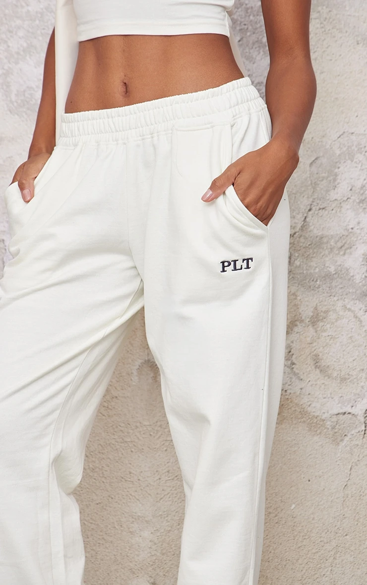 PRETTYLITTLETHING Cream Contrast Embroidery Wide Leg Low Rise Sweatpants - Image 4