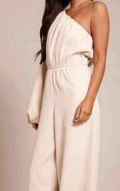 Prettylittlething Cream Woven Aysmetric Sintched Waist Jumpsuit -Pretty Little Thing Shop 93e916339285241adbeca1da509e16f01e8490cd CNO3082 4 cream woven aysmetric sintched waist jumpsuit