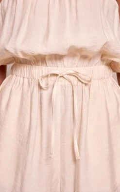 Prettylittlething Cream Woven Textured Bandeau Romper -Pretty Little Thing Shop 97086806a396e95249b312fecb8b54f32293621c CNN5509 4 cream woven textured bandeau playsuit