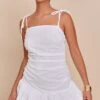 Prettylittlething White Ruched Detail Strappy Puffball Dress -Pretty Little Thing Shop 97690f2a0b46a077ef37663ffc6ecf64a1d59fcc CNM1556 1 white ruched detail strappy puffball dress