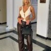 Chocolate Faux Leather Pleat Detail Wide Leg Pants -Pretty Little Thing Shop 9a249b781b72ca3cb6d82c57559471ce623658b7 cmn0378 1