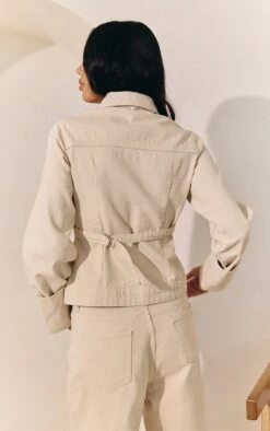 Prettylittlething Ecru Turn Up Cuff Cinched Back Denim Jacket -Pretty Little Thing Shop 9a81f02568ecf4b77191e2856bebae294d57e1ab CNM5533 4 ecru turn up cuff cinched back denim jacket