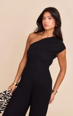 Prettylittlething Black Chiffon One Shoulder Ruched Jumpsuit 8 Prettylittlething Black Chiffon One Shoulder Ruched Jumpsuit -Pretty Little Thing Shop 9c6325f4bb2d6c0da5dc8deb22627026f7f733da CNN5494 4 black chiffon one shoulder ruched jumpsuit