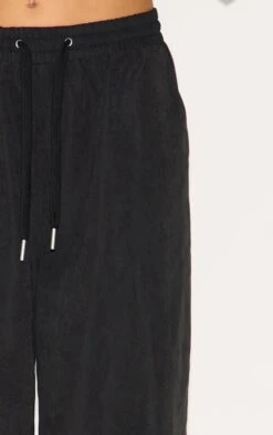 Prettylittlething Black Peach Skin Woven Wide Leg Pants -Pretty Little Thing Shop 9dbe4817904dea143693f32080466da44beaaf49 CNM0139 4 black peach skin woven wide leg trousers