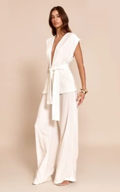 Prettylittlething White Textured Tie Waist Jumspuit 7 Prettylittlething White Textured Tie Waist Jumspuit -Pretty Little Thing Shop a53af1d58331578a1003aee5ae8ad25c7a0f1b89 CNN7786 3 white textured tie waist jumspuit