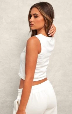 Prettylittlething Cream Embossed Sleeveless Cotton Top 6 Prettylittlething Cream Embossed Sleeveless Cotton Top -Pretty Little Thing Shop a7ec4b7b89319a3daf966781f56374f9c146f824 CNJ8740 2 cream embossed sleeveless cotton top