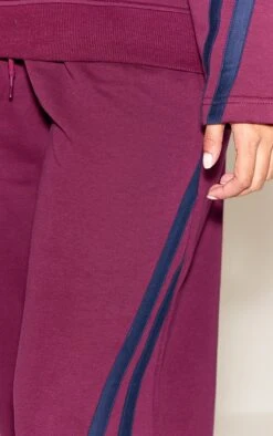 Burgundy Contrast Striped Wide Leg Sweatpants -Pretty Little Thing Shop a82afaf494a71afb1164ce9a1f9197a6bd42b003 CNO1315 4 burgundy contrast striped wide leg joggers